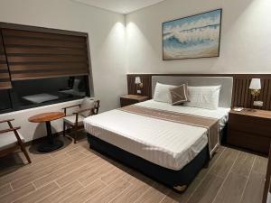 a hotel room with a bed and a bathroom at Trang An Heritage Hotel in Nguyên Ngoại +18 photos