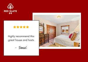 a red star hotel room with a bed and a dresser at 4BR Townhome Near Canyon Lodge & Lakes Basin in Mammoth Lakes