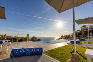 a villa with a view of the ocean at Dimora Maiuri L'Olivella in Anacapri