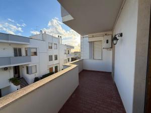 a view of a balcony of a building at Dimora Giovanna in Poggiardo +4 photos