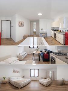 a living room and kitchen in a white apartment at Oasi Bernareggio Smart Work & Relax in Bernareggio