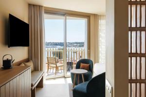 a hotel room with a view of a room at Sabatic Formentera Autograph Collection in Es Pujols