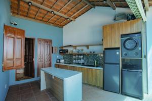 a kitchen with a washer and dryer at 4be Cá Heo in Cầu Sông Kinh