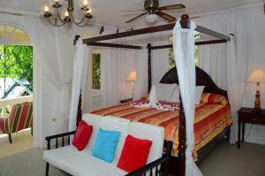 Postelja oz. postelje v sobi nastanitve Firefly Beach Cottages