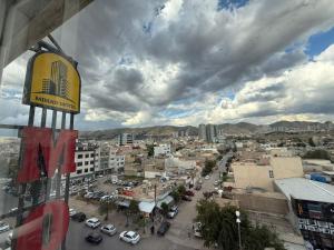 a view of a city with cars on a street at Hotel Mihad sulaymaniyah in As Sulaymānīyah