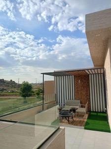 a view from the balcony of a house at استراحات وفلل رفايا in Abha