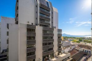 an apartment building with balconies on the side at Charming apartment in downtown Floripa EDC402 in Florianópolis