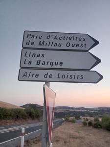 a street sign on the side of a road at studio in Saint-Georges-de-Luzençon