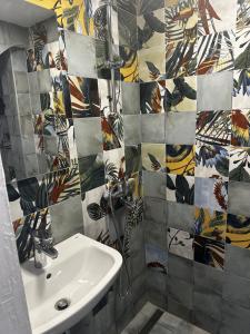 a bathroom with a shower and a sink at Lovor apartmani in Zelenika +15 photos