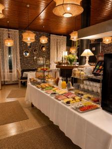 a buffet line with many different types of food at Pension Stadt Mannheim in Mannheim