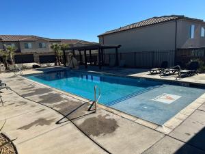 a swimming pool in the middle of a yard at Desert Oasis in Washington