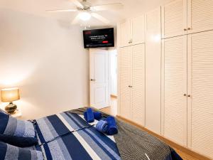 a bedroom with a bed and a ceiling fan at Solymar Premium Apartment 2 in Playa del Ingles +46 photos