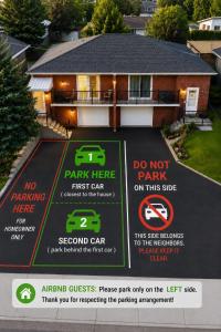 a sign in front of a house with a do not park sign at Tamuna's Home in Hamilton
