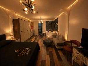 a living room with a couch and a table at Vera Suite Hotel in Istanbul