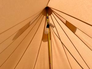 a close up of the top of an umbrella at Albania Glamping in Himare +50 photos
