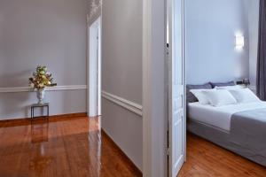 Ένα ή περισσότερα κρεβάτια σε δωμάτιο στο The Zillers Boutique Hotel