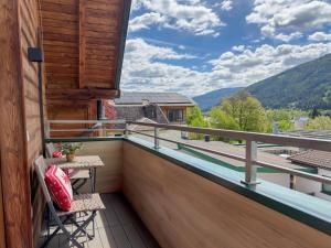 a balcony with a view of the mountains at Chalet-Apartment Alpenresidenz in Sankt Michael im Lungau