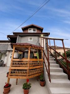 a house with a staircase leading up to a house at Villa Risteski Ohrid in Ohrid