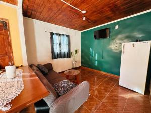 a living room with a couch and a table at Sueño de Chicoana in Chicoana