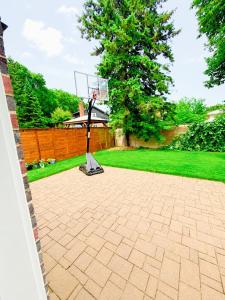 a basketball hoop in the middle of a yard at Your own home in Toronto
