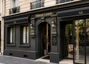 a nathan lenoir store on the side of a building at Hotel Maison Lenoir in Paris +22 photos