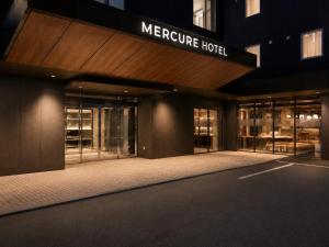 a store front of a hotel at night at Mercure Niseko Resort Formerly known as Midtown Niseko in Kutchan +67 photos