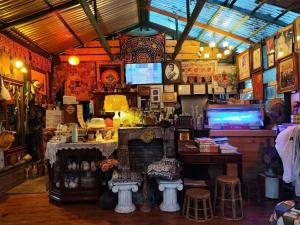 a shop with a room filled with lots of items at Slove U House in Khon Kaen