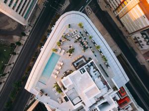 an overhead view of a building with a pool at ME by Meliá Lisbon in Lisbon