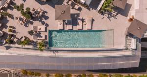 an overhead view of a swimming pool in a building at ME by Meliá Lisbon in Lisbon