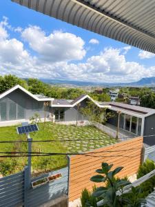 a view from the balcony of a house at Lakshmi 2BR House Da Lat in Ấp Phước Thánh