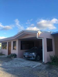 a car parked in the garage of a house at Casa Palo Verde in Bagaces