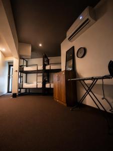 a room with two bunk beds and a desk at Igloo Stays Edapally in Cochin +11 photos