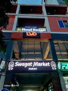 a sign on the front of a building at Hotel Swagat in Itahari