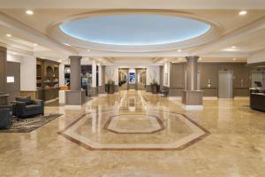 a large lobby with a large ceiling and a large room at Doubletree by Hilton, Leominster in Leominster +23 photos