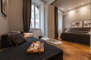 O zonă de relaxare la Amazing Suite Piazza Venezia