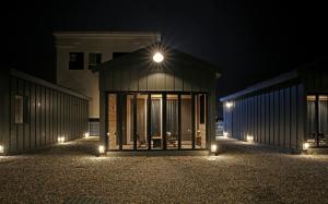 a building with a light on top of it at night at Yangyang Sloskip in Yangyang