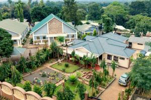 an aerial view of a house with a courtyard at Kivulini Homes in Moshi
