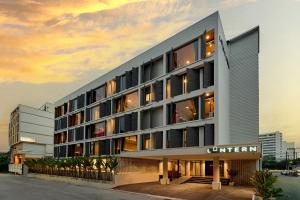 a rendering of the exterior of a hotel at Lantern Chiang Mai Night Bazaar Hotel in Chiang Mai