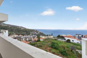 a view of the ocean from a balcony at Calheta Atlantic Pearl in Calheta