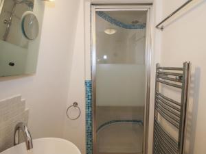 a bathroom with a shower and a sink at Hadley Park Windmill in Telford +39 photos