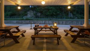 a picnic table with a plate of food on it at Samcheok Healingcamp Pension in Samcheok
