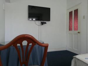 Televiisor ja/või meelelahutuskeskus majutusasutuses B&B El Olivar