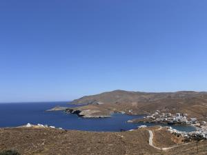 a view of a small island in the ocean at Faros House Kythnos in Loutra