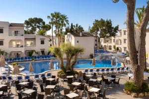a view of the pool at the resort at Cabot Club Torreblanca in Sa Coma
