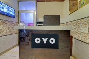an office with an ovo sign on a counter at Collection O The Legend Hotel, Hisar in Hisār