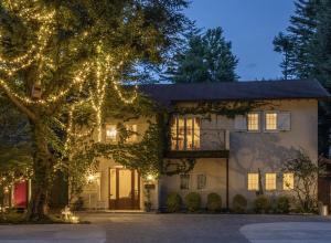 a house with christmas lights on it at Auberge de Primavera in Karuizawa
