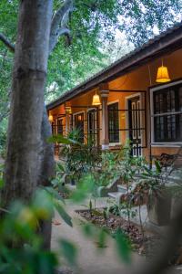 a building with trees in front of it at A4 By Gabaa in Habarana +47 photos