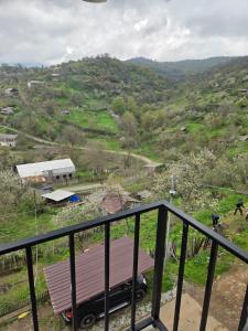 a view from the balcony of a house with a hill at hyuratun Shamlugh in Shamlugh