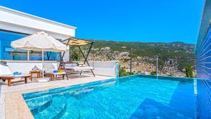 a villa with a swimming pool with a view at Secluded Sea View Honeymoon Escape Jacuzzi Private Pool-Villa Bella1 Orkide in Üzümlü