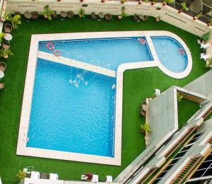 an overhead view of a swimming pool in a resort at Galaxy La Palm Royal Hotel in Port Harcourt